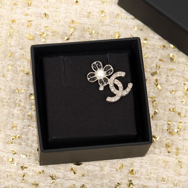 Ch*el brooches